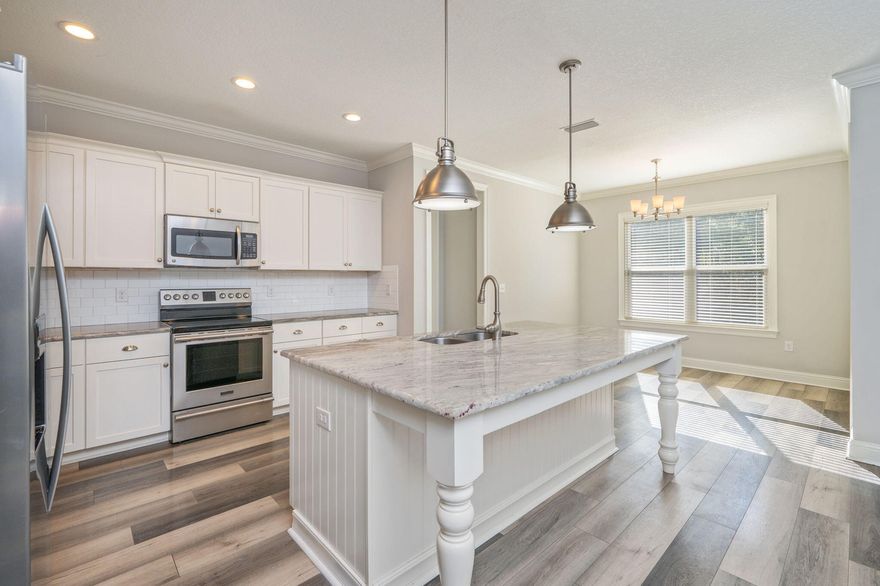 SELLERS WILL CONTRIBUTE UP TO $10,000 TOWARD BUYER'S CLOSING COSTS!!! Check out this beautiful 4-bedroom, 2-bath home located on a large lot in the highly sought-after Mill Creek Farms subdivision. From the moment you arrive, you'll notice the attention to detail throughout this immaculately maintained Randy Wise home. Features include 8' doors, crown molding, stainless steel appliances, granite countertops and covered front/back porches. The open-concept living area is perfect for entertaining and is complemented by a versatile flex room ideal for a home office, playroom, or formal dining space. The private owner's suite is thoughtfully separated from the three additional bedrooms. Luxury vinyl plank flooring runs throughout most of the home w/ carpet only in the primary bedroom and tile in both bathrooms. Step outside to enjoy your own backyard oasis complete w/ a sparkling heated swimming pool installed in 2023. The spacious, fully fenced backyard features a double gate, a deep lot that extends beyond the fence line, and a yard building for additional storage. Other notable features include a side load garage and irrigation system. This home offers comfort, style, and space inside and out and is a must-see in Mill Creek Farms. Buyer to verify and satisfy themselves to all areas of importance. The TVs left in the home will convey (there are a total of four). 