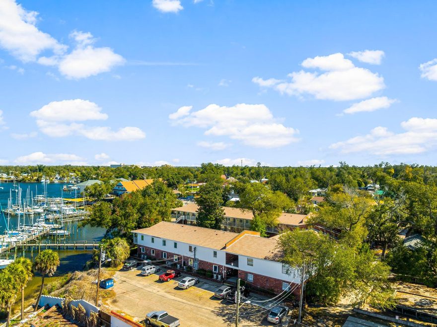 This exceptional 34-unit waterfront community, complete with a 22-slip marina, is now offered at a newly adjusted price, creating an even stronger value proposition for investors. In addition to its comprehensive renovations and prime waterfront amenities, the property includes an income-generating on-site laundry facility and a low-maintenance marina that produces steady net revenue, further strengthening the asset's operational performance. With 22 units fully renovated down to the studs in 2020, upgraded mechanicals, new roofs, contemporary interiors, and a history of consistently high occupancy, this community offers both stability and long-term growth potential. Positioned within the heart of Downtown Panama City's ongoing revitalizationfeaturing upgraded streetscapes, improved walkability, and renewed waterfront developmentthis asset remains one of the most compelling opportunities in the market. The pricing adjustment simply aligns the offering with current investor activity and enhances the property's already strong return profile.