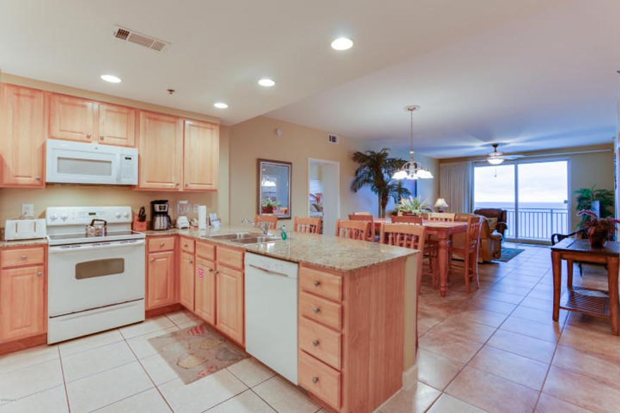 Beach living at its finest in the perennial favorite beach property, Splash. This beach inspired 2 Gulf front bedrooms (both master suites) + bunkroom, 2 bath condo has riveting Gulf views while sunshine and warm gulf breezes abound from the wrap around balcony. The spacious kitchen features slab granite counters and breakfast bar. Open Windsong floor plan is decorated with the beach and sun in mind - both the kitchen, family rooms and both master suites are gulf front and have breathtaking views. Conveys fully furnished and rental ready! The property is truly turn key! Meticulously maintained  new HVAC and water heater within the last two years. HVAC has been fitted with the revolutionary Coastal Green Air energy conservation system to lower utility costs