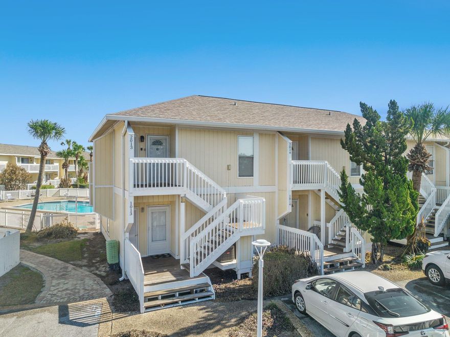 Looking for a condo community on the beach?  This is the one you have been waiting for! Ready to sit on the deck over-looking the pool and golf course? Personal use and rental income go well together. This 1 bed/1bath condo is being sold FURNISHED, sleeps 4, recently painted, new furniture, wood flooring, granite kitchen counters.  Walk to beach. Sandpiper Cove was developed on 43 acres that stretch from the Gulf of Mexico to Highway 98. Amenities include 1,100 feet of deeded beach access, with beach service, 5 pools (2 heated), 3 hot tubs, 6 tennis courts (also marked for pickleball) canal dockage, owners only marina, boat launch, event center and one of the best restaurants in Destin, the Louisiana Lagniappe. Schedule a showing right now!