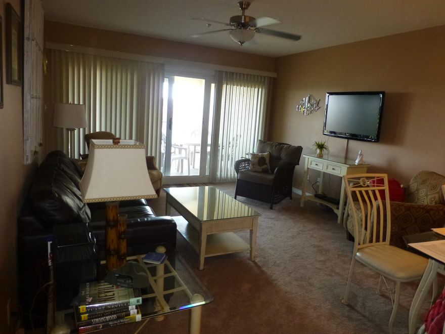 Top floor unit with side Gulf Views. Over looks Avalon subdivision. Recently renovated with new cabinets and granite in kitchen. New vanities and fixtures in both baths. New carpet throughout. New mattresses on all beds including new mattress on sofa sleeper. New paint.Maravilla is a 33 acre gated community. 2 pools, one heated in winter, hot tub, tennis courts, shuffleboard, clubhouse with kitchen and exercise room, grills, basketball court. Beautiful private beach. Maravilla has it all. Very spacious unit. All dimensions to be verified by buyer.