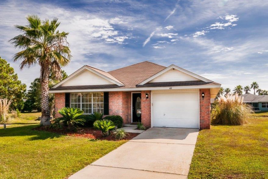 This brick garden home in Bayside Subdivision offers an open floor plan with tile floors, vaulted ceilings, new carpet and a well sprinkler system. Bayside Subdivision amenities include a fishing pier about 1 block from home, pool, tennis courts, and picnic area.