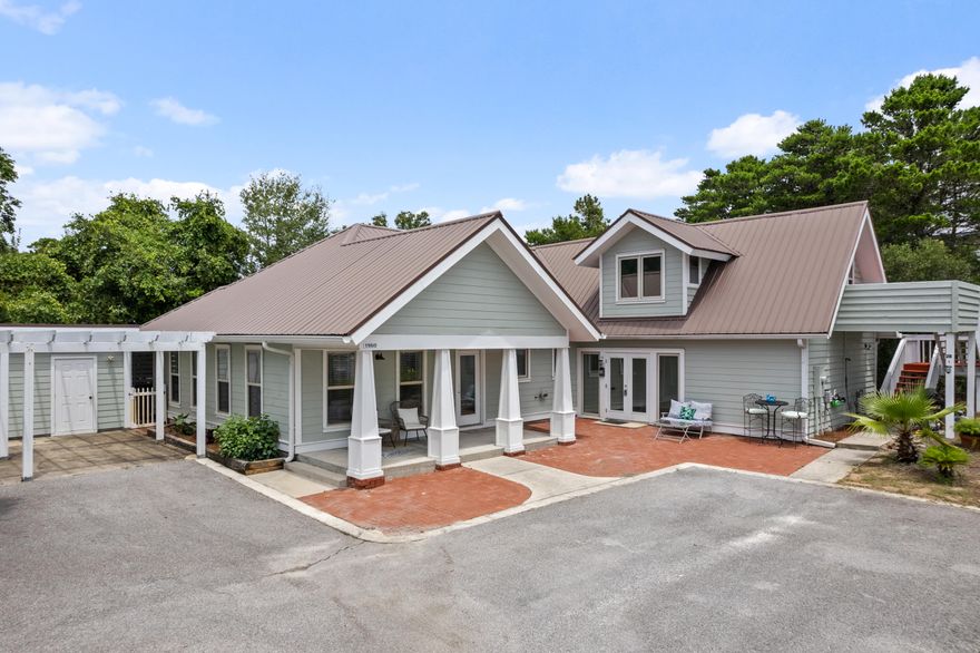 2 minutes - 0.3 miles to Blue Mountain Public Beach Access! Location, Location, Location!  This fully furnished, rental ready 4-bedroom, 3.5-bathroom home, includes a full mother-in-law suite on the upper level and is located in the heart of 30a's charming coastal community. This versatile property offers a unique opportunity for various living arrangements, including three separate rentals, two rentals, or a primary residence with an additional rental studio unit upstairs. Perfect for investors seeking rental income or families desiring a primary residence with added rental potential, this property is a rare find. The entire property has been recently painted both inside and out, ensuring a fresh beachy feel and inviting appearance.  The main home features a fully-equipped kitchen with granite countertops and a breakfast bar perfect for entertaining. The large master bedroom boasts a shiplap accent wall and a private ensuite with a corner whirlpool tub and double vanities. The main living area includes a sliding barn door that separates it from a second lockout section, which comprises two bedrooms, a Jack-and-Jill bathroom, and a cozy sitting area with a two-seater dining table.

The second-floor guest quarters are self-contained with a private entrance, offering a living room, separate bedroom, kitchenette area, and a bathroom with a stand-up shower and single vanity. The property also provides plenty of storage with numerous closets throughout (check out the virtual tour to view) and two additional storage closets outside. Ample parking is available with a double carport and additional spaces for guests. The private back patio features a covered gazebo with outdoor furniture.  

Blue Mountain Beach, named for its blue lupine flowers and South Walton's highest elevation at 65 feet, offers a perfect blend of natural beauty and relaxation. Enjoy a bike ride from Big Daddy's Bike Shop to the art gallery of Justin Gaffrey. Cool down with handmade ice cream at Blue Mountain Creamery, savor fresh Gulf seafood and live music at Red Fish Taco in Redfish Village. This charming coastal community is a true gem for those seeking both adventure and tranquility. Don't miss out on this incredible opportunity to own a fully furnished, multi-use property in a prime location!
