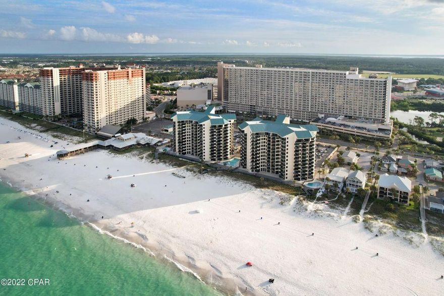 BEAUTIFUL completely remodeled gulf front condo. As soon as you walk in you will see the fabulous views of the World's Most Beautiful Beaches! New EIFS siding, all new composite decking throughout the complex, new balcony railings, new hurricane impact windows and more. This 4th floor condo is the perfect height with easy access to all the amenities this resort has to offer. All 3 pools have been newly restored and there is now a new tiki bar. Located in a gated complex with plenty of parking and no parking garage to go in or out! Convenient to fine and casual dining, St Andrews State Park, Pier Park, entertainment and so much more! SELLER has already paid the $30K special assessment fee. Buyer to verify all data and dimensions.