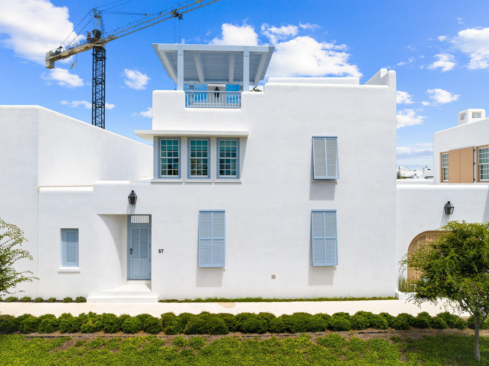 Timeless luxury meets gorgeous live ability in this Gary Justiss designed Alys Beach home.  You're immediately welcomed in by 2 separate open, light filled covered loggias, and sunny courtyard with heated pool. Relax, unwind, and take it all in as you immerse yourself in this seamless floor plan, meticulously designed by interior design firm, Colgan Simon, for both entertaining and thoughtful living. This 4 bedroom home offers dual primary suites - one on the main level and one on the second, with an additional 2 guest suites and a cozy bunk niche on the 2nd floor. Experience breathtaking views of the Gulf of Mexico and the Alys town center from the third floor's expansive terrace.