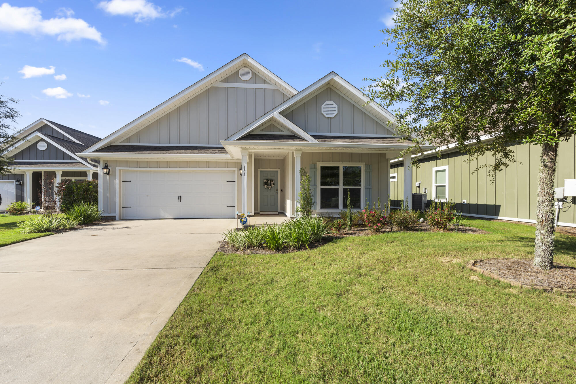 Introducing your next home! Tucked perfectly within the exclusive, gated Firefly subdivision of Hammock Bay, this charming single-family home offers the perfect blend of modernization, community amenities, and serene natural surroundings. As you step inside, you'll notice the seamlessness of contemporary design. From the welcoming foyer, to the cozy living area, every detail exudes style, privacy, and comfort. The floor plan connects the living room, dining area, and kitchen, creating a spacious and inviting environment, perfect for entertaining, or spending quality time together with your loved ones, while soaking-up all the natural lighting. The kitchen is a true centerpiece, featuring granite countertops, stainless steel appliances, ample cabinetry, a large pantry, and a bar. The master bedroom provides a peaceful retreat, complete with two large closets, an en-suite bathroom, that includes a double vanity, and updated shower with a built-in-seat for convenience. The two additional bedrooms offer versatility for guest accommodations. A fully-equipped shared bathroom with a bath-tub serves these bedrooms. Additionally, the entire home is outfitted with a state of the art Smart Home Advantage alarm/security system. Step outside to your private outdoor oasis, where a covered patio overlooks a sizable, fenced in yard, perfect for relaxing with your morning coffee or hosting gatherings. Not to mention, you are only a short stone-throw-away from your own community-exclusive pickleball courts, and pool.The greater Hammock Bay offers residents a wealth of amenities, including a resort-style pool, a professional lap pool, and a newly updated fitness center with state-of-the-art equipment. Enjoy leisurely walks along the community's picturesque trails, or take advantage of the sports facilities, including tennis and pickleball courts, a basketball court, frisbee golf, playgrounds, and a nearby recreation center. The community clubhouse serves as a gathering place for events and social activities, fostering a strong sense of community. Conveniently located near shopping, dining, and entertainment, Hammock Bay also features its own grocery store, Props Brewery, dentist/medical building, food trucks, and an outdoor amphitheater. Just a short 25-minute drive to the Emerald Coast beaches, this home combines the best elements of coastal living, convenience, and natural beauty, in one of Northwest Florida's most sought-after communities. Don't miss the chance to make this remarkable property your own. Schedule a private showing today!