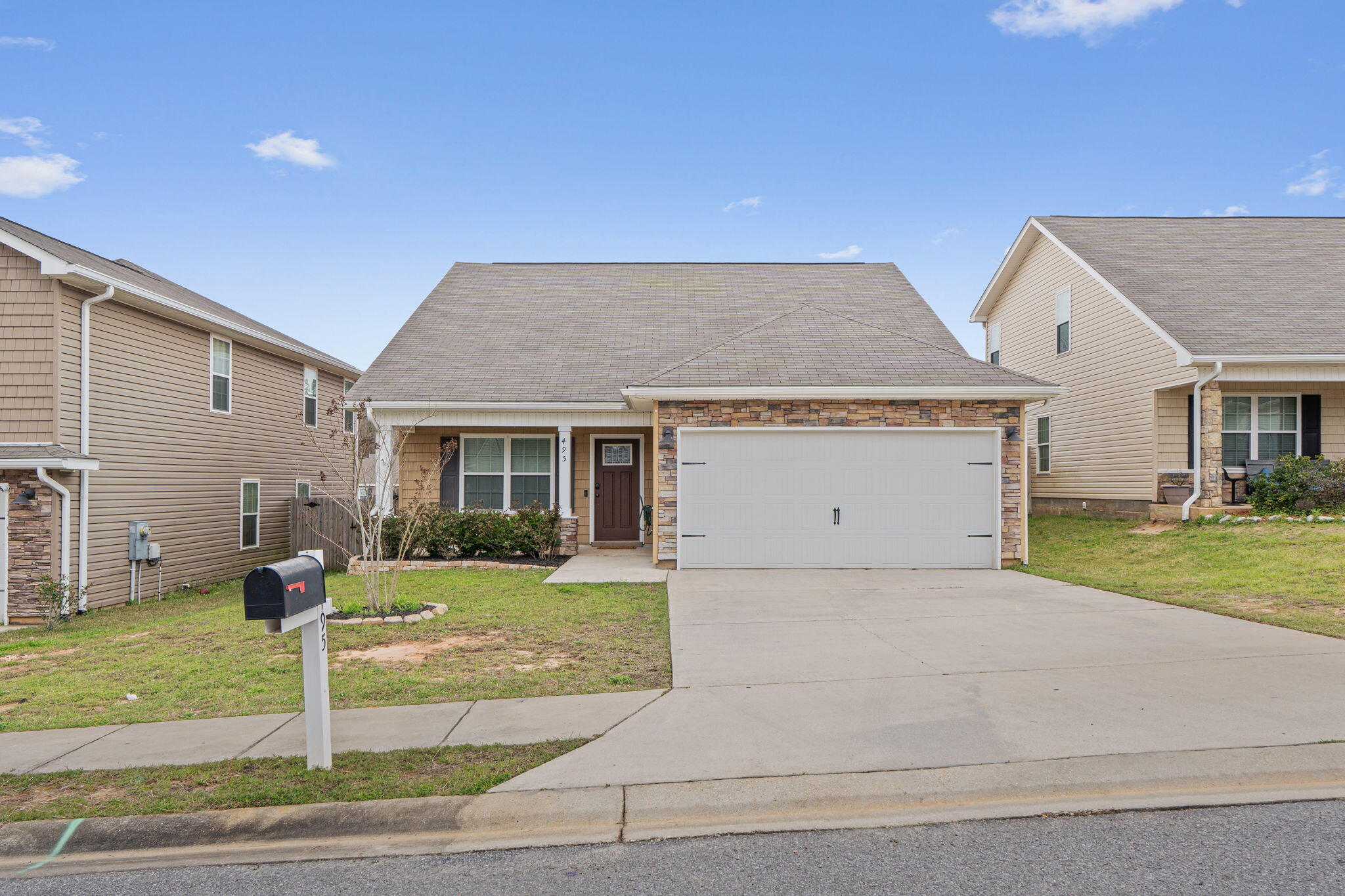 Welcome to this beautifully designed 4-bed, 2.5-bath home w/upstairs bonus area--perfect for a home office, playroom, or media space! The inviting living room features a sleek electric fireplace, while the well-appointed kitchen offers stainless steel appliances, ample counter space, and tile flooring throughout the main living areas for easy maintenance. The downstairs primary suite provides a peaceful retreat with a walk-in closet, separate shower, and soaking tub. Step outside to a fully fenced backyard with a firepit and no rear neighbor, offering added privacy. A covered front porch and 2-car garage complete the home. Seller is offering a 1/1 Buydown Option JUST FOR YOU! That could save you nearly $200/mo on your mortgage payment the first two years. Contact me TODAY for more details! Conveniently located near downtown Crestview and multiple military bases, this home blends comfort, functionality, and a prime location. Schedule your showing today!