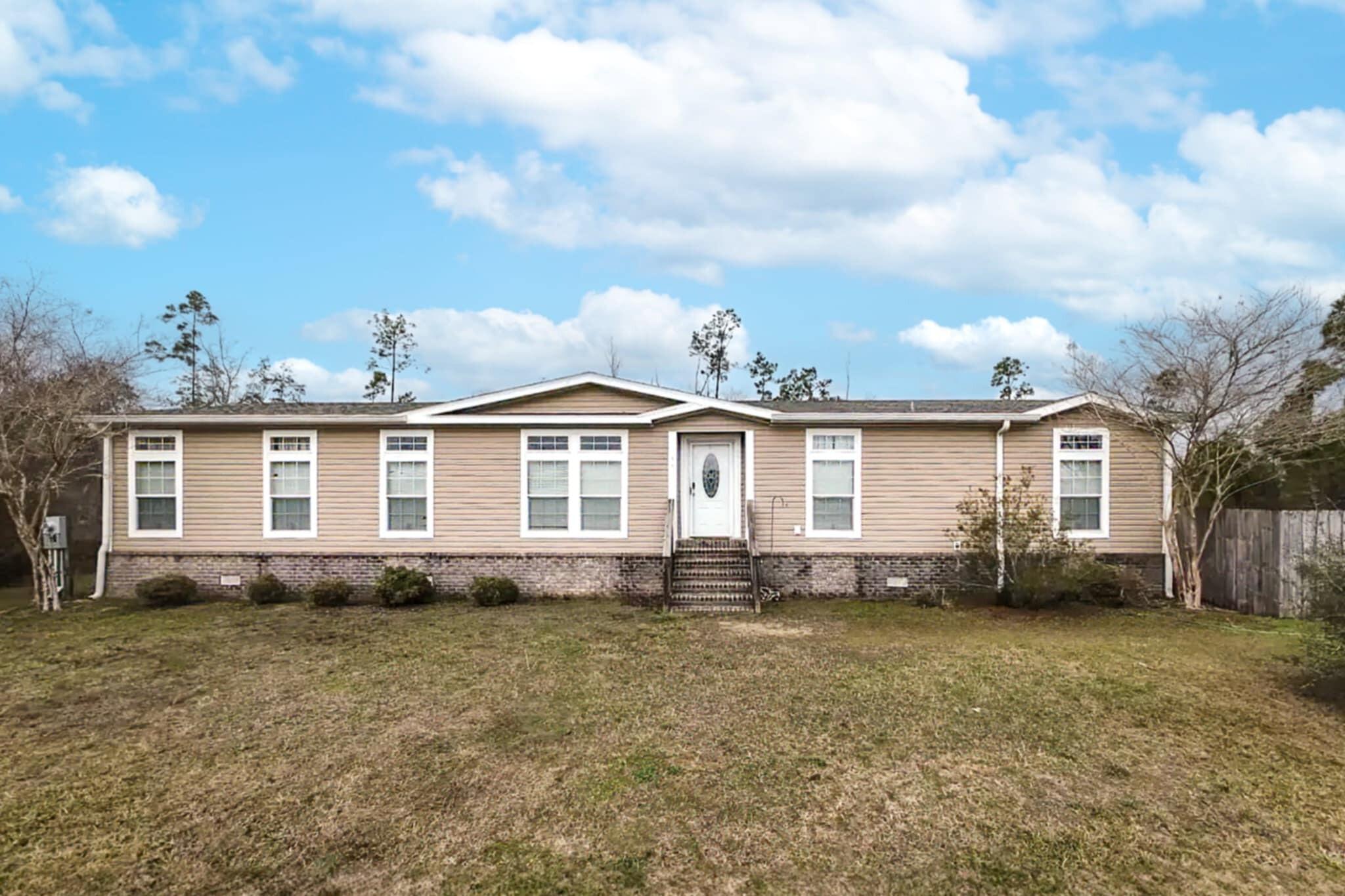 Quiet country setting just minutes from Eastern Shipbuilding and Tyndall AFB. Large, comfortable 3bd/2bth home with just under 1 acre, located in Callaway Heights, approximately one and a half mile from Hwy 22. Interior offers open floor, split bedroom floorplan. Kitchen offers a lot of storage, large kitchen island with refrigerator and dishwasher. The living room features built in entertainment center with additional shelving. Impressive master bedroom with seating area and large master bath area, with huge walk in closet. Very comfortably designed home in a convenient, yet quiet setting.