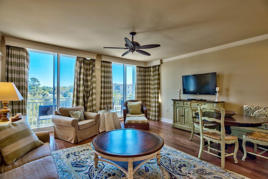 Fewer than 150 yards from stunning white sand beach and the tranquil, emerald green waters of the Gulf of Mexico is this inviting condo unit within the most recently completed building surrounding the colorful town center of Gulf Place, Six Palms. Situated on Scenic Highway 30A, Gulf Place is home to lively on-site dining and boutique retail destinations, bike and water sport rentals, as well as seasonal concerts and events hosted on its sprawling two-acre green. There is even a local pharmacy, conveniently located on the ground floor of Six Palms, and community pools.This 2-bedroom, 2-bath Gulf view unit has beautiful finishes throughout and is the perfect blend of modern elegance and beach chic. Beautiful hardwood flooring extends throughout the unit and tile in the bathrooms.