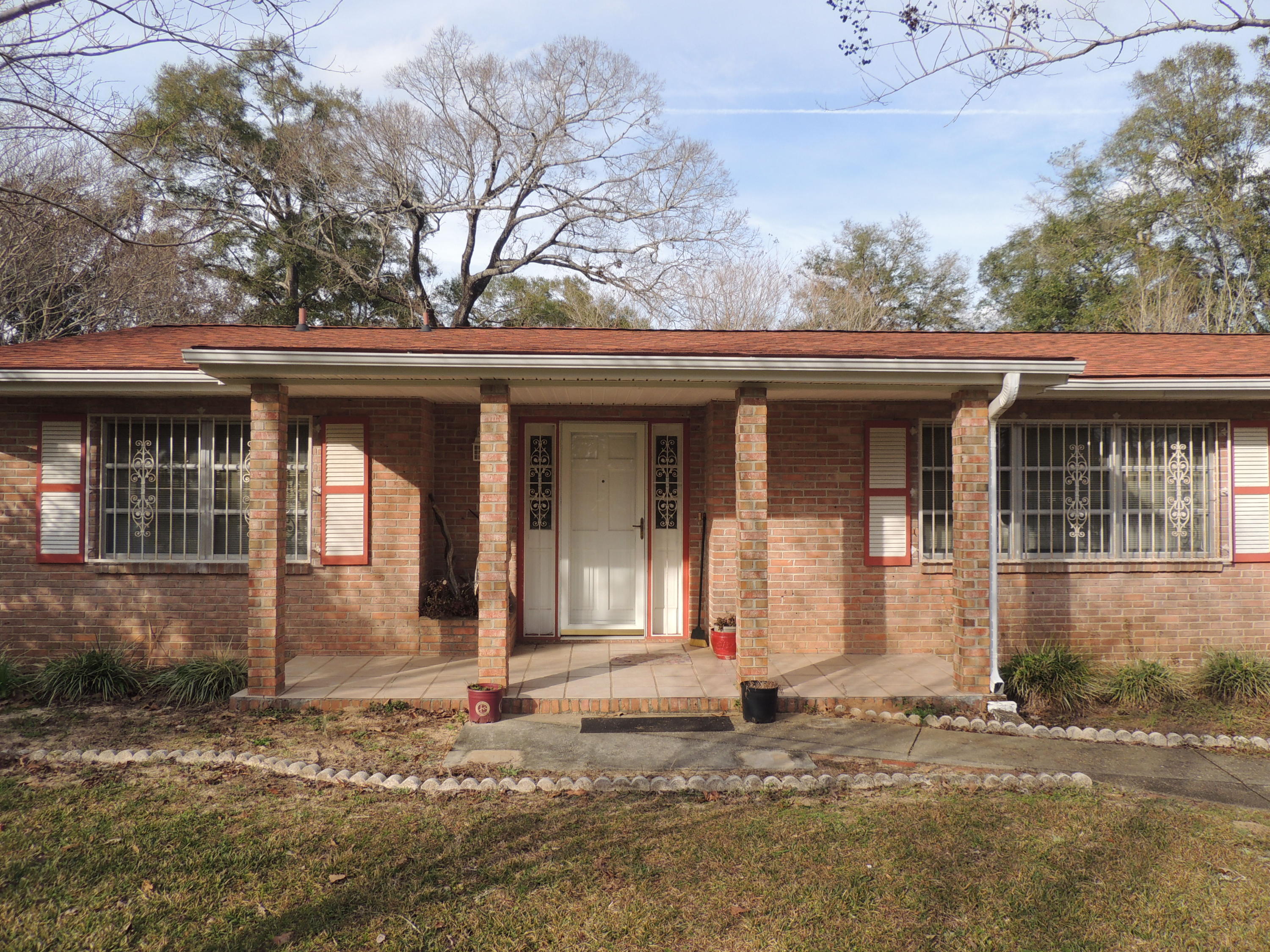 GREAT location, just needs some TLC! So much potential, here!! This home boasts a formal living area, separate den, formal dining room, breakfast area, sunroom and lots of closet/pantry/storage space - there are 3 pantries. New roof in Sept., 2016 with fully transferable 50-year Warranty!! New Carrier HVAC units, inside and out, in 2011! Multiple lots create this 0.81 acre, making this a great size lot with plenty of outdoor space. With the metal workshop/garage, this property is just waiting for it's new owners to make it their own! All dimensions are approximate, buyer to verify.