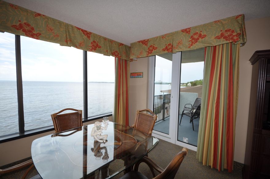 Expansive Bay Views from the Living/Dining Room, Kitchen and Bedroom in this 2nd Level, Fully Furnished, Rental Ready Condo in Bayside of Sandestin. 2018 RENTAL Income reservations of $24,000 with potential of $25,000+ by year end. NEW AC in March 2018. Enjoy the views of the Marina, fireworks and sunsets from your Dining room, balcony or bedroom. Relax by the pool and Tiki bar and breakfast and lunch are just steps away at the Sunset Bay Cafe conveniently located next door. The Linkside Golf course, Linkside conference center, Bayside Ballroom and fitness center are adjacent. Priced to sell quickly.