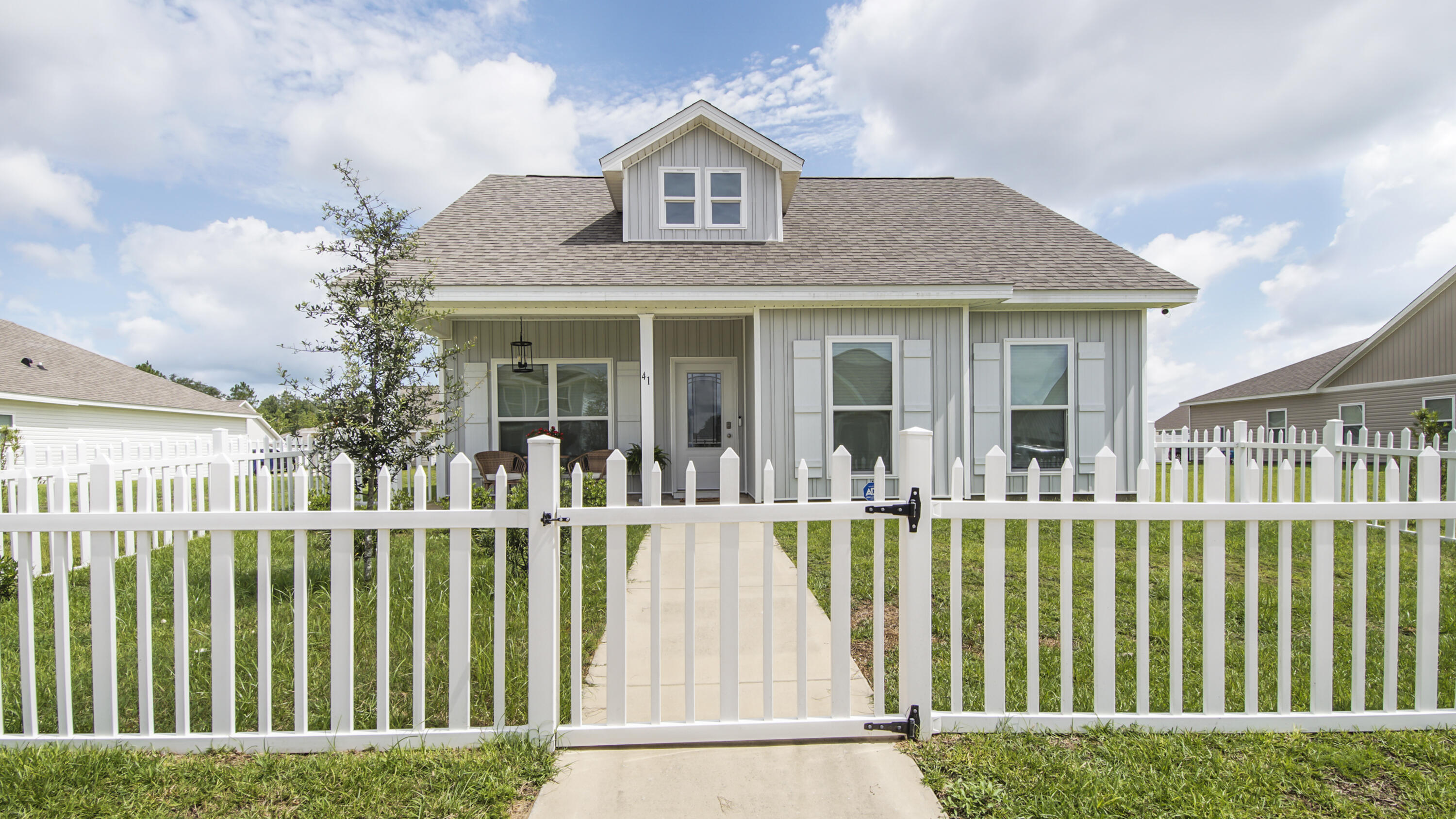 Welcome to 41 Woodsorrel Street, a charming 3-bedroom, 2-bath home located in the desirable Owl's Head subdivision of Freeport, FL. This popular Aspen floor plan spans 1,682 SqFt and offers carefully curated upgrades throughout, thanks to its owner, a talented interior designer.From the moment you arrive, you'll appreciate the attention to detail, starting with the inviting white fence and matching shutters, alongside the elegant white glass front door. Inside, the home is painted a serene sea mist color, creating a peaceful ambiance. Enjoy the comfort and style of ceiling fans in all bedrooms and the living room, as well as a stunning custom chandelier in the dining room. Practicality meets elegance with new knobs installed throughout and thoughtfully placed towel racks and toilet paper holders in the bathrooms. The durable hard surface LVP flooring throughout adds a touch of sophistication.
As an added bonus, the washer, dryer, and refrigerator are included with the sale, making this home move-in ready. The Owl's Head community features a neighborhood park with paved walking trails and a spring-fed lake, offering the perfect setting for outdoor relaxation. Don't miss the chance to make this beautifully upgraded home your own.