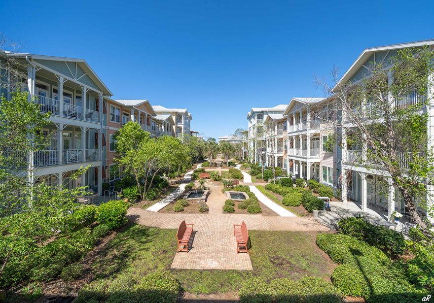 Experience elevated coastal living in the heart of Panama City Beach, renowned for its miles of sugar-white sand and the emerald-clear waters of the Gulf of Mexico. Nestled within a fully gated, resort-style community surrounded by lush tropical foliage and scenic walking paths, this exceptional residence offers the perfect blend of luxury and leisure. Residents enjoy world-class amenities, including a spectacular one-acre lagoon-style pool, game and theater rooms, basketball and pickleball courts, and a state-of-the-art fitness center -- all designed to make every day feel like a vacation. This condo features 1 bedroom, 1.5 baths, and a versatile bonus room, thoughtfully designed across two spacious levels. The main floor welcomes you with a generous living and dining area, a spacious kitchen, convenient half bath, and two oversized storage closets perfect for beach and pool essentials. Upstairs, the owner's suite serves as a private retreat, complete with a cozy sitting area, spa-inspired ensuite bath, two large walk-in closets, dedicated laundry area with additional cabinetry, and a flexible bonus room ideal for guests or a private office. Two private balconies provide the perfect setting to enjoy morning coffee or evening sunsets, while soaring 10-foot ceilings, elegant crown molding, and dramatic floor-to-ceiling windows flood the home with natural light and elevate the space to impressive new heights. Whether you're seeking a full-time residence, a second home, or long term rental investment opportunity, this stunning condo delivers refined comfort in one of Florida's most desirable beach destinations. Please note that the photos match the floor plan but are not photos of the actual unit due to renter in place. Floor plan is in the documents tab.