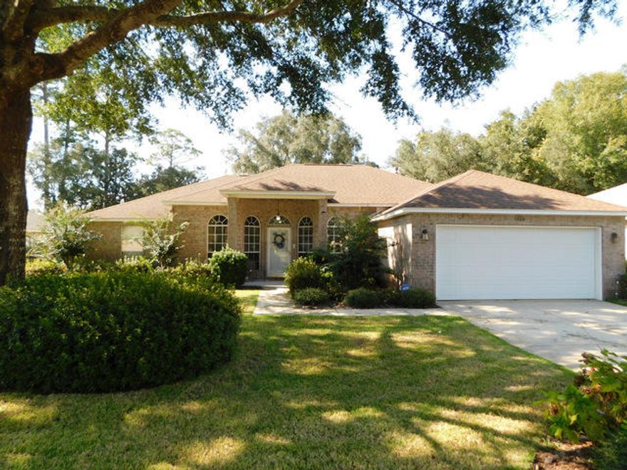 This is ''Turn Key home is in excellent condition and very well cared for. The kitchen was upgraded with soft close doors/drawers, granite counter tops & tiled back splash. The dimensional roof is about 5 years old and the home comes with professional Hurricane shutters. There is a beautiful shaded lot and an in ground sprinkler system, all located at the end of a cul-de-sac for privacy! Inside, you will find a light and bright home with 3 bedrooms in a split floor plan plus a large office/ media room and a Sun Room for relaxing. There is crown molding, large upgraded base boards and trim casing throughout. The master bathroom has His/Her closets and double sinks along with whirlpool soaking tub and walk-in shower. The HVAC system was also replaced about 5 yrs ago. This is a beautiful hom