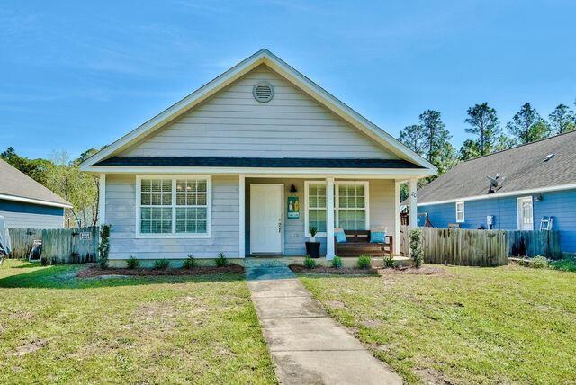 Great 3-bedroom Florida cottage located in the heart of the Town of Santa Rosa just off Chat Holley Rd. This home is situated on a nice size lot and is perfectly located close to all you need to enjoy the coastal lifestyle so many desire! The home is just 1.5 miles from Cessna Landing Park & Boat Launch, only 4 miles to Gulf Place & Ed Walline Public Beach Access, and just a 10 minute drive to Grand Boulevard for upscale shopping, fine dining, and fun entertainment.Upon entering you are greeted with vaulted ceilings, crown molding, and several large windows allowing plenty of natural light in making the home nice & bright. The home offers a spacious open floor plan boasting 1,504 sq ft! The kitchen features a large breakfast bar, stainless steel appliances, and ample cabinets.