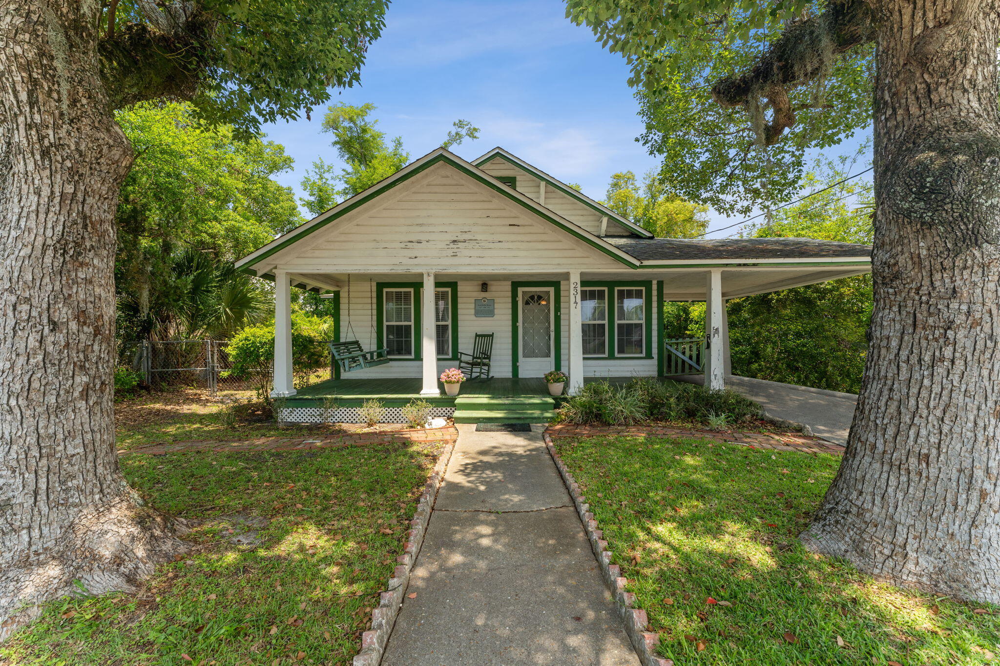 Welcome to the Scott/Yerby House. Are you ready to unlock the full potential of a historic Florida home? This rare opportunity awaits you and thisproperty has all the makings of something truly special. This one-of-a-kind home boasts a rich history, with beautiful architecture and unique features. Thisproperty is located in the historic waterfront community of Millville with its unique character, rich history, and alluring charm, make this home one of a kind.Original pine wood hardwood flooring throughout. Many updates in the main house circa 2007 include an updated kitchen with stainless steel appliances. The main house is 1472sqft with 3 bedroom, 1 bathroom. Nestled behind the main house is a 444 Sqft, 1 bedroom, 1 bathroom carriage house, perfect for a rental on theproperty,
