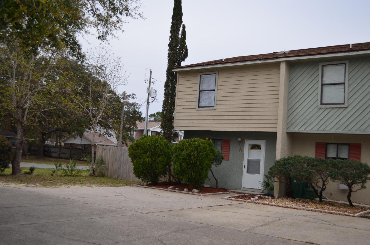 Lovely townhome in Central Ft. Walton , conveniently located to both bases and the beaches. This 2 bedroom 1.5 bath home has been freshly painted with tile floors on the downstairs and carpet upstairs. There is an extra room on the back that is perfect for the kids play area. The upstairs has 2 bathrooms for each bedroom with a shared tub/ toilet combo. There is a large closet upstairs as well that could be a small office. The townhome has a brand new hot water heater and getting a new roof. Great investment or 1st time home.