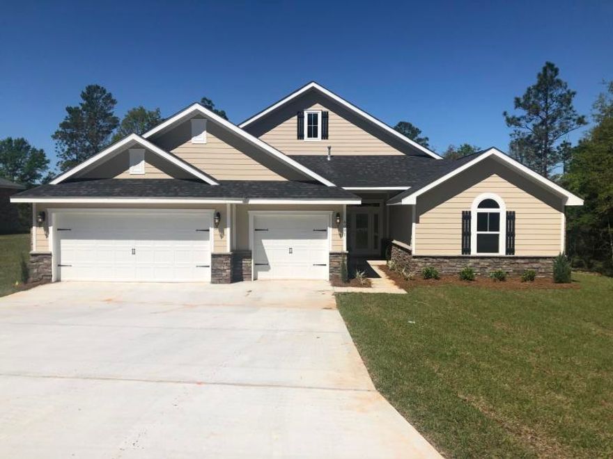 *COMPLETE & READY DECEMBER 2019* Please TEXT Agent for construction status.*Brand New Floor Plan & Location central to everything! 7 miles from Navarre Beach Bridge and 12 miles to 1-10 *2 Master Suites each with Zero Entry Tile Walk in Showers *4 Bedrooms *Open Floor plan *3 Full Baths * 1/2 Bath * 3 Car Garage *Attic access with pull down stairs* Lot is 1/4 acre on sewer * Covered Entry * Mohawk Luxury Wood Vinyl Plank in Formal Areas and Wet Areas * Mohawk Carpet in Bedrooms *Tile in both Master Bathrooms *Kitchen has Huge Walk in Pantry, Granite Countertops & Large Island *Stainless Steel Appliances *Spacious Family Room with Double Trey Ceiling & Tall E-glass Windows that let in lots of natural light. *Builders Warranty Included.
