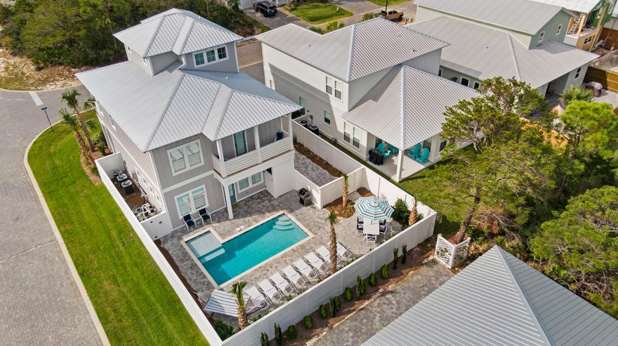 The Lazy Magnolia is a newly built, home away from home! The Lazy Magnolia is a  7 Bedroom, 7.5 Bath home that sleeps up to 24. The home is 3 stories, decorated with an elegant farmhouse style, making it very cozy and very relaxing! The home features it's very own private pool with a kiddie/tanning area attached. The community is located off of scenic highway 98, very close to the popular Whale's Tale restaurant and beach access. There's a private, designated beach access for you right outside of the community.  Also within 2 miles of the home are countless restaurants, Grocery Stores, gas station, CVS Pharmacy, 2 large and popular public beach accesses, and much more! Call for your private showing today.