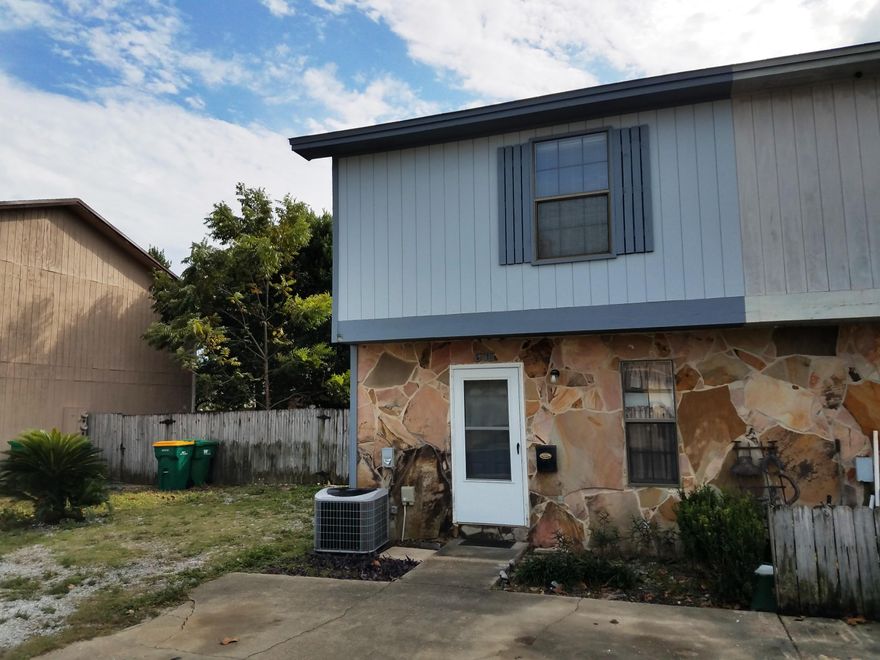 HUGE LOT! END UNIT!! One of the best deals in Destin with a home warranty included. This 2 bedroom (upstairs), 3 full bath (2 upstairs/1 downstairs), 1 office/bonus room (downstairs) is located in the heart of Destin. Tile in kitchen and hallway, hard wood floors in the living area, carpet upstairs. There are no association fees. Less than 2.5 miles to multiple beach access points. Shed is being sold as is. Close proximity to the new crosstown connector in Destin. Square footage is larger than PA report, to be verified by purchaser.