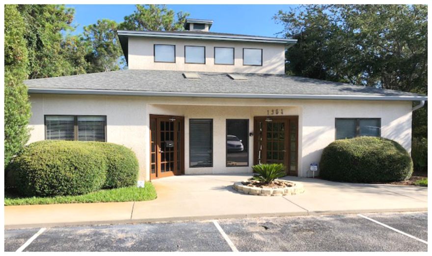 Turn Key medical building with the possibility of being devised to accommodate 2 tenants as the 2,679 SF building has 2 lobby/waiting areas, 2 reception areas with sliding glass windows, 6 private room with sinks, 3 restrooms and nurses station. Tile/wood flooring, large windows providing views to secluded woods. 2nd floor is an open concept space that has a restroom with shower and washer/dryer hook ups. Beautifully maintained building with views of Beautifully maintained building with views of secluded woods and accessed via lighted intersection at Hwy 98 and Country Club Rd.