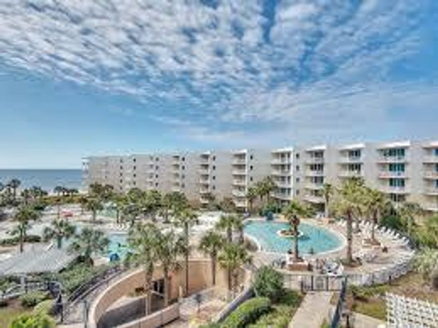 A 5th floor, 1 bedroom / 2 bath condo with BUNKS is now available at Waterscape! This top rental income producer is decorated perfectly with updated furnishings throughout and gorgeous gulf views!This well appointed condo features 9 ft ceilings, crown molding, washer/dryer, stainless steel appliances, granite counter tops, beautiful cabinetry, and more! Enjoy a gorgeous patio that you can access from the living room AND master bedroom. This is the best location Fort Walton Beach's Okaloosa Island has near excellent restaurants and attractions. A beautifully landscaped courtyard includes two hot tubs and three resort-style pools, plus a Lay-Z-River and a 10-foot waterfall.