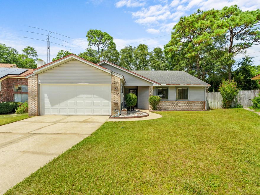 Welcome to this charming 3-bedroom, 2-bathroom home located in a desirable area of Niceville. This home features stainless steel appliances in the kitchen, perfect for cooking up delicious meals. The master bedroom boasts a walk-in closet for ample storage space. Enjoy the beautiful Florida weather on the screened patio or in the spacious yard, complete with an outdoor storage shed for all your gardening tools. Gather around the fire pit with friends and family for cozy evenings outdoors. The oversized garage provides plenty of room for parking and additional storage. Don't miss out on the opportunity to make this house your home!
