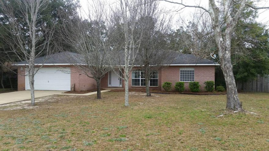 New Roof, A/C & carpet. All brick and fenced! An open and split floor plan in Holley By the Sea! Three bedrooms, two baths, and a beautifully wide and spacious entry and foyer area. Windows that bring in the perfect amount of lighting. The open and split floor plan features: cathedral ceilings, fireplace, breakfast bar, eat-in kitchen, and a formal dining room. The Large master-suite bath has a double vanity, whirlpool tub showcased under a decorative-block window. A separate shower and two walk-in closets. A large backyard, and a 2-car garage. An HOA with access to the multi-million dollar Rec Center with pool, gym equipment, steamroom and so much more for your enjoyment compliments the purchase, as a bonus to ownership . A must see home before you decide on your dream property!