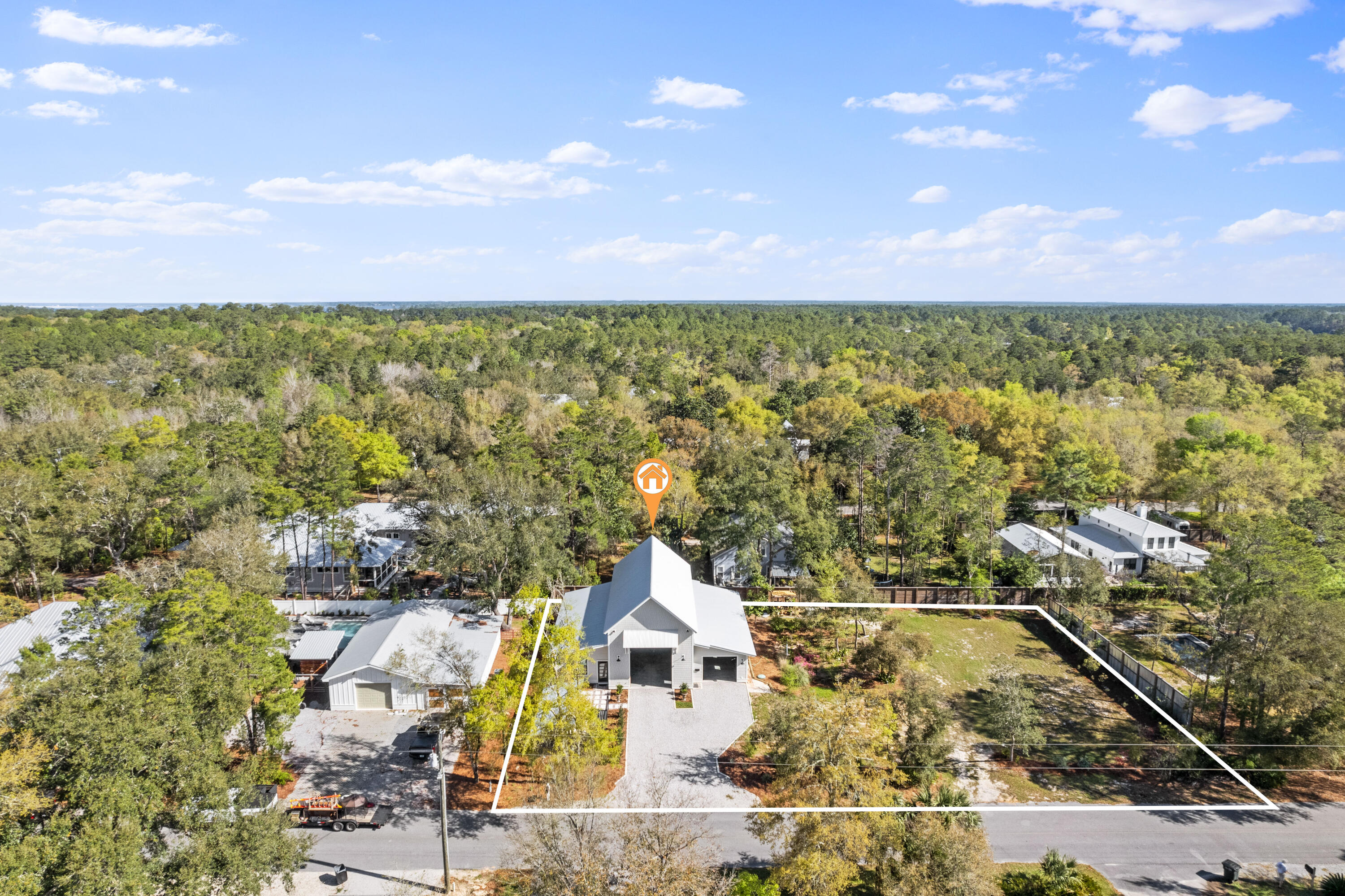 Incredible climate controlled RV/Boat garage with 800 sq ft. of livable space in the highly sought after Point Washington area. Got Toys? Not a problem with this 56 foot long interior garage space with RV hookups (30 and 50amp), 14ft garage door, and second garage bay that can fit three vehicles bumper to bumper. ALL Climate Controlled. There's even a buildable lot included to build your dream home to go with your dream garage. For boaters, the HWY 395 boat launch is right down the street, so you can be in the water within minutes.