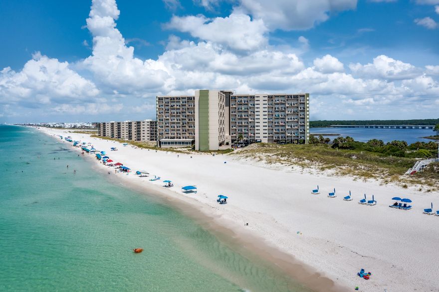 This recently renovated 2 bedroom 2.5 bath condo is perfectly located in the private, gated community of Carillon Beach. This unit has incredible views of the gulf and Lake Powell.  You can see the water from basically every room!  If you're looking for a vacation getaway or a rental machine this is your unit!  This 2 story condo has custom cabinetry, upgraded granite countertops, crown molding and a half bath downstairs for convenience.  The Pinnacle Port community offers so much more than the beautiful gulf and sandy beach.  Enjoy indoor, heated and outdoor pools, shuffleboard and tennis courts, grills, children's playgrounds, bocce ball and a boat slip can be arranged.  This condo is perfectly situated between 30A and Pier park.