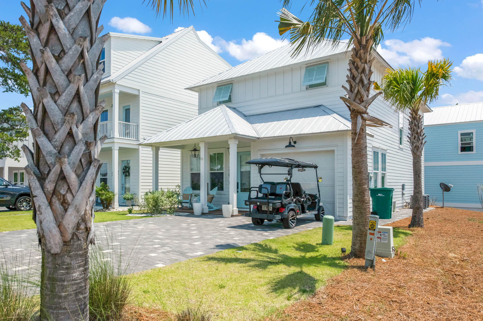 Coastal living at it's finest. Short stroll to the newly constructed beach access. This lovely home features many extras including, GE Cafe appliances, hardwood floors, two master bedrooms, Epoxy coated garage floor, Ipe decking on front porch, upgraded lighting and so much more. Fully furnished and ready to enjoy.