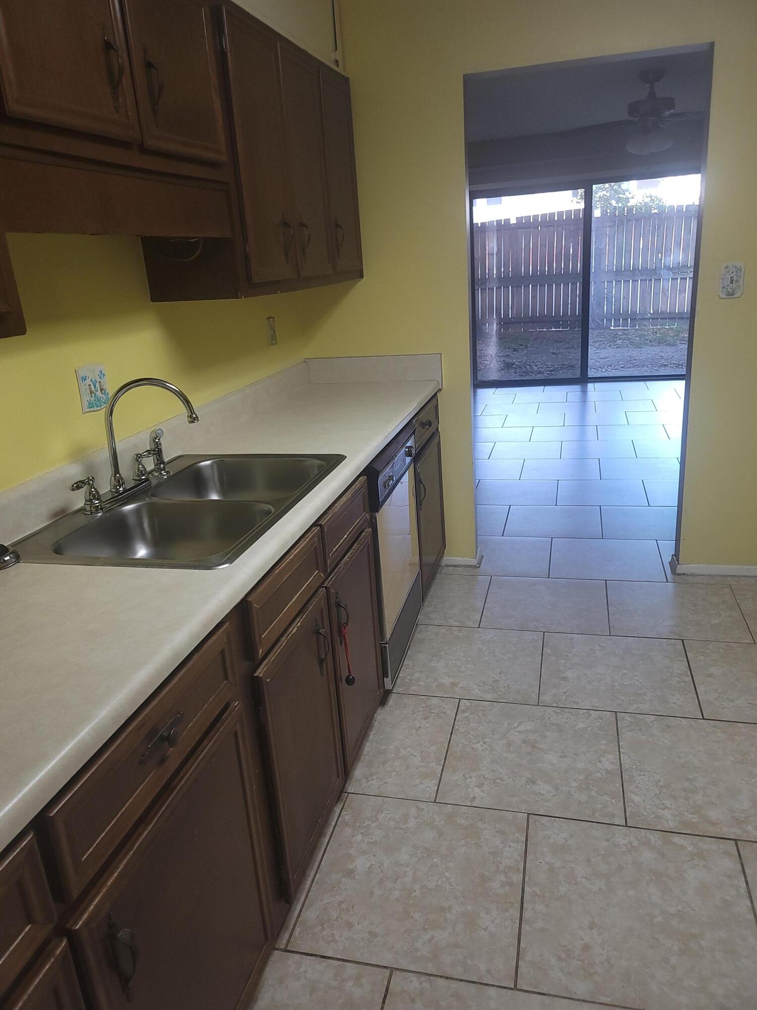 Contract fell thru and back on the market This townhome is very large and is sold as is. Located in a very convenient area makes it close to everything you may need. Close to schools, shopping and restaurants. Don't miss the opportunity to purchase a home to make your own. This townhome offers a bonus room for extra storage, there is lots of space here.