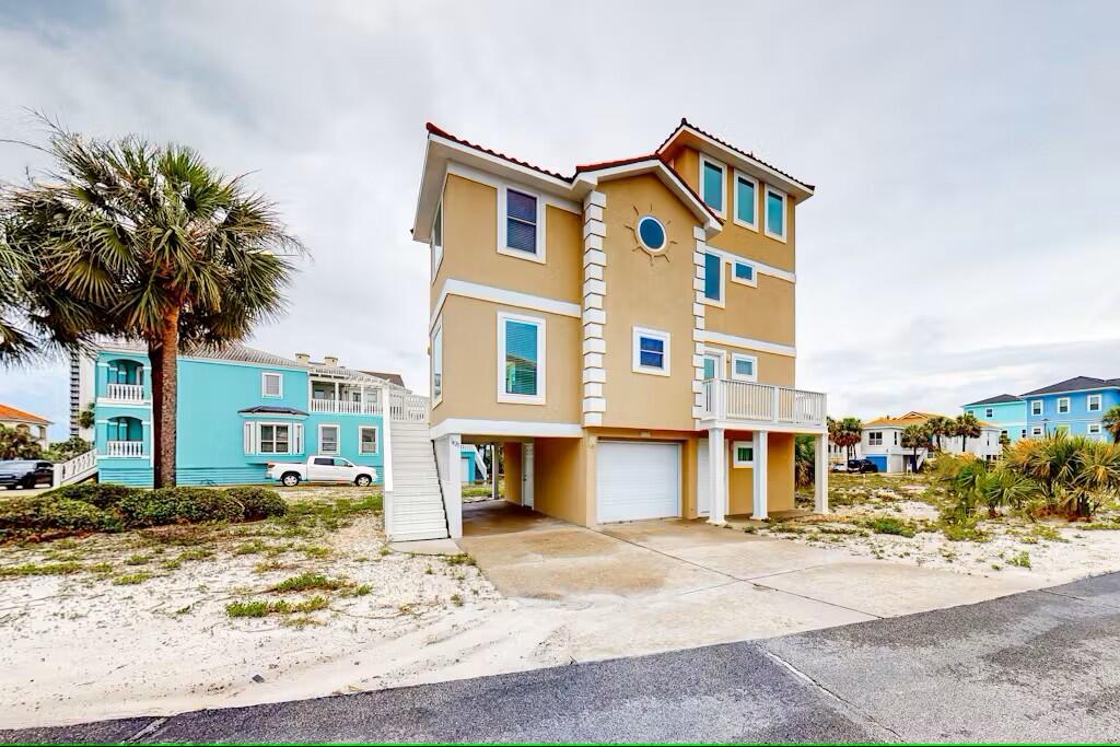 Your Dream Beach Home Awaits!Step into coastal luxury with this stunning, fully renovated beach home in the highly coveted Village at Navarre. With $200,000 in upgrades, this property is a true gem!As you enter the ground level, you'll find a welcoming foyer with access to the spacious garage and a staircase leading to the main living area. On the first level, the open concept living and dining areas feature a beautiful fireplace, creating a warm and inviting atmosphere. The kitchen and breakfast nook offer the perfect space for gathering, and a convenient laundry room and half bath complete this level. Sliding doors from both the kitchen and living room open onto a brand-new oversized deck, ideal for entertaining, with easy access to the driveway. A separate balcony off the first floor provides a peaceful spot to soak in the breathtaking sound views.
Upstairs, the second level boasts a serene master suite with a private deck and a fully remodeled master bath featuring a luxurious tile shower, LED touch mirror, and elegant finishes. Two additional spacious bedrooms and a fully updated bath complete this floor.
The third level is a bright and airy loft with panoramic views of both the sound and the Gulf the perfect retreat!
Back on the ground level, the one-car garage offers ample storage, while the covered parking area easily accommodates vehicles, a boat, or jet skis. The covered back patio is perfect for grilling and unwinding after a day at the beach.
This home is just steps from sound access and has public beach access right across the street. Plus, enjoy the community pool for even more fun in the sun!
Strong investment potential with conservative rental projections of $68,000-$78,000 per year, this home comfortably sleeps 10.
The homeowners have spared no expense, with recent updates including:
New metal tile roof (2022)
New hot water heater (2023)
New hurricane impact windows & doors (2023)
New decking & stain (2023)
New fresh interior & exterior paint and seal (2023)
New A/C Units (2024)

Whether you're looking for a primary residence, vacation getaway, or investment property, this beachside beauty has it all. Schedule your private showing todayyou will be glad you did!

