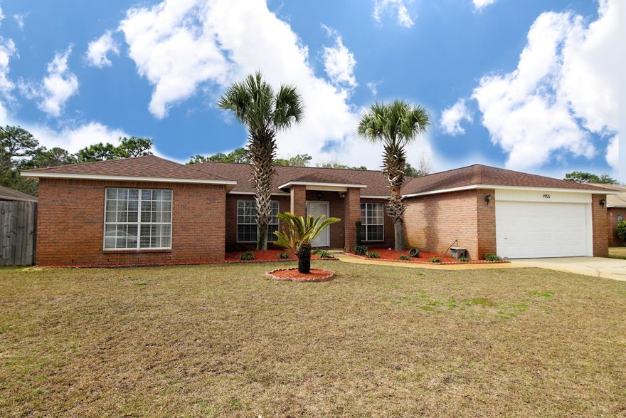 Completed renovated and move-in ready home with 4 bedrooms and 2 baths located in Navarre, FL! This home is located close to bases, beaches, shopping and restaurants! The roof was replaced in 2015, which makes the insurance low and affordable! As you pull up to the home you will notice the gorgeous tall palm trees that line the entry way! Enter through the storm door into a foyer with the dining room to one side and the home office to the other side of the entry way! This home features an open floor plan with the kitchen opening to both the living room and dining room. In addition there is a split floor plan with the master bedroom located on the opposite side of the home from the guest bedrooms! The kitchen and the bathrooms are completely updated! The kitchen features granite countertops, stainless and black appliances, a tiled backsplash, and new custom cabinetry to include glass cabinet doors and large brushed nickel hardware! In addition the kitchen has a tiled backsplash, a French Door refrigerator, built-in microwave, and Island! The kitchen sink has a picturesque window overlooking the large, fenced backyard! This kitchen is perfect for entertaining! The living room features vaulted ceilings and has French Doors to that open to an large Patio!  All the flooring throughout the home has been updated to gray laminate and gray tile in the wet areas! In addition the lighting through the home has been updated! The master bedroom is large and has windows overlooking the back yard! The master bathroom features a modern vanity with granite counter tops and brushed nickel hardware and faucets. The home features a two car garage with an automatic garage door opener. The home owner has maintained this home impeccably and is offering a home warranty with basic coverage. Hotwater heater approximately 3 years old and HVAC approximately 7 years old. Buyer to verify all dimensions and information. 


