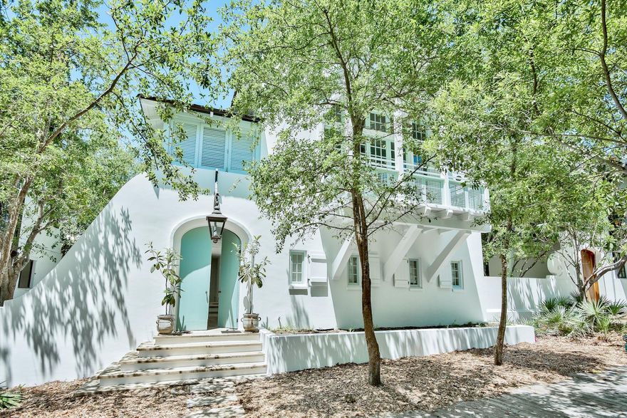 New Exterior of all-white stucco with light blue shutters now complete. Large lot accommodates a pool. This West Indies design by noted architect Ruard Veltman offers a unique architectural style in a fabulous south of 30-A Rosemary Beach location.Quality abounds in this custom three level, four bedroom, four and one-half baths classic. Features include curved masonry walls, vine draped arbor trellises, cedar shake roof, shuttered porches, copper gutters, and oversized lanterns. Your private courtyard connects with the very scenic boardwalk H and is steps to the beach.Newly updated interiors feature a bright color palette of whites and pale gray.Enter to find three bedrooms on the first floor; a beautifully appointed master suite, as well as two guest rooms with private baths.