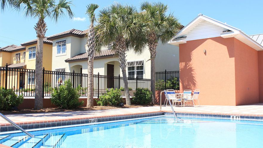 This STUNNING 4 bedroom/4 bathroom town home is just around the corner from the deeded beach access with rental projection of $50k! Built and finished with class and quality! Crown molding, 6' baseboards, 18'' tile and hardwood flooring. Granite, stainless and plenty of cabinets are in the large kitchen overlooking the single level breakfast bar and living area. This town HOME has been professionally decorated with a low key ''we are at the beach'' design. Sleeps 12 with a king down, master with over sized closet, 3rd bedroom with 2 queen beds & the 4th bedroom has a bunk that sleeps 4 each with own bathroom!