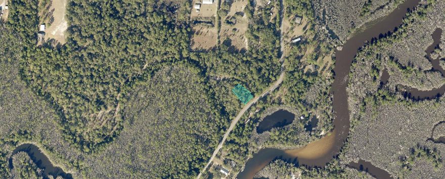 Beautiful wooded .24 acre lot zoned  AG-RRSpend your weekends on the water of Blackwater River while building your dream home