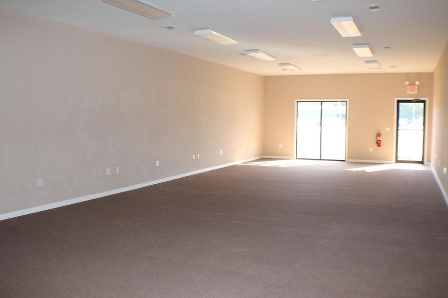 1,000 SF of warehouse or retail space in high traffic location on E Hwy 90/James Lee Blvd! Open space for your business with a restroom!