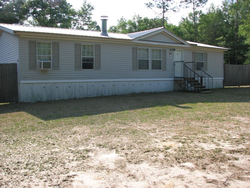 NO PETS! Are you looking to get away from the busy loud city? Nice 3-bedroom, 2 bath mobile home on 1/2 acre. And you don't have to give up the convenience of the easy commute to all the bases (Eglin, Duke, Hurlburt,7th special forces). The mobile home has vinyl and carpet flooring, central heat and cool, large bedrooms and closets, and a deck on the back for grilling. Well water is included in the rent; all other utilities are the responsibility of the tenant. Credit check, no inside smoking, security deposit $1100.00