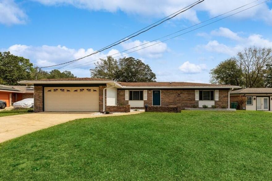 Check out this 4 bedroom, 3 1/2 bath home in central Niceville! Close to schools and shopping this home is in an excellent location tucked into a quiet cut-de-sac. The semi-open floor plan includes a front living room with incredible natural light, a great flex space, and a kitchen that opens to a large dining area that has space for all of your friends! The bedrooms are split with the master off of the kitchen- complete with a walk-in closet and changing area. The 3 additional bedrooms are off the main living area with the largest of them having it's own attached bathroom- think *second master bedroom*! The flat back yard has a beautiful Magnolia tree that provides shade as well as a porch area with tons of potential. Updates and Features Include: removal of popcorn ceiling, guest, hall, and back bedroom bathrooms updated with new flooring, paint, and vanities. Master bathroom has double sinks and oversized shower with dual shower heads. Extra built in cabinets in garage for storage, hurricane shutters for 4 windows on rear of home, whole house gutters, termite bond with Terminex and monthly pest control. These owners have loved this home and pride of ownership shines through!