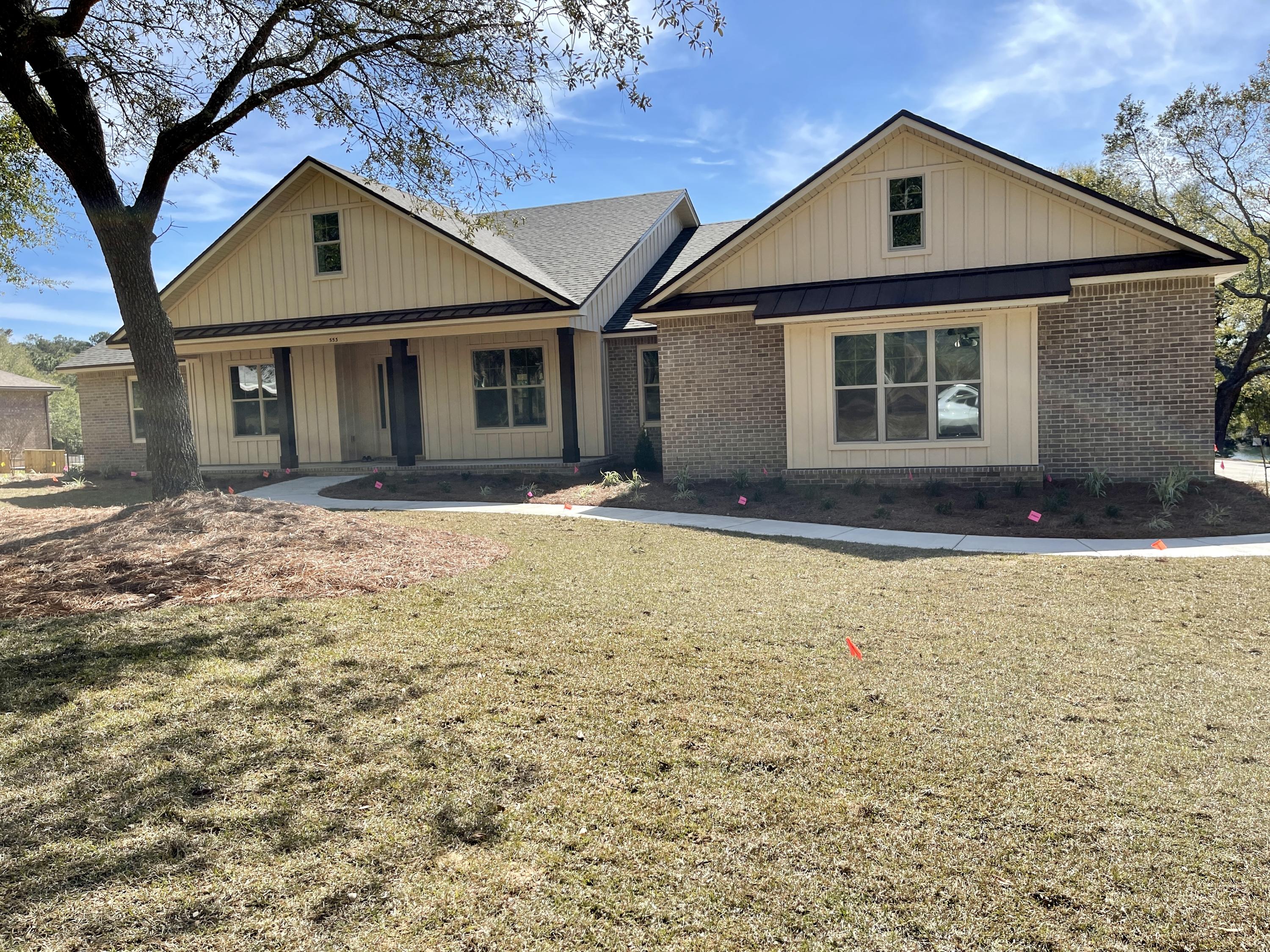 Absolutely gorgeous new home with an amazing view of Rocky Bayou Golf Course and lakes. Built by a local, family-owned builder with over 40 years experience in custom residential home design and building - this home exudes customs architectural design and features! A few of the many interior features include 10' ceilings in the main area with oversized crown moulding, arched openings, built-in and a beautiful stone fireplace /media center. Its' open floor plan allows for wonderful natural light and views throughout the home.
