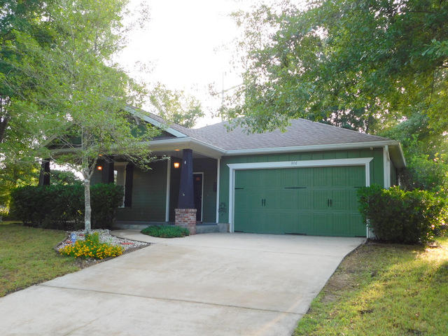 Beautiful Craftsman style home, So. of I-10, with a split bedroom floor plan & an open living concept. The home has been well cared for and has many nice upgraded features. Built in 2007, this home has on demand gas hot water, gas heat and a gas corner fireplace. The interior is trimmed out in Craftsman style casing and doors. There are transom windows, tile, wood laminate and carpeted floors, maple cabinetry and the open kitchen comes with the major appliances. Outside you will find a peaceful, shaded lot, privacy wood fencing, a full in ground sprinkler system, the Craftsman style touches a large covered front porch for relaxing and entertaining guests. The seller is even offering a one year home warranty for that extra peace of mind. Awesome home & South Side Location!