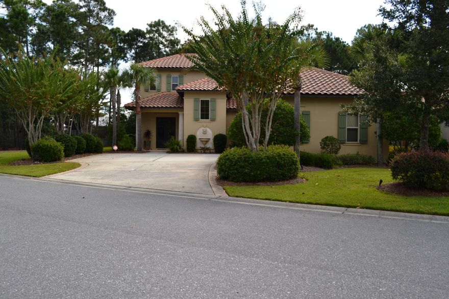 Best value in Sandestin! Ready to move in, this beautiful home in Sandestin's popular Vineyard area features top of the line kitchen, ground floor master and guest rooms, spacious living area and relaxing screened outdoor space. Upstairs has a bedroom with private bath and a multipurpose den that can be used as a fourth bedroom or for whatever your needs may be. Side yard is private and adjoins a wooded common area that can't be built on allowing many possibilities for a pool or future add on. Don't miss this opportunity!