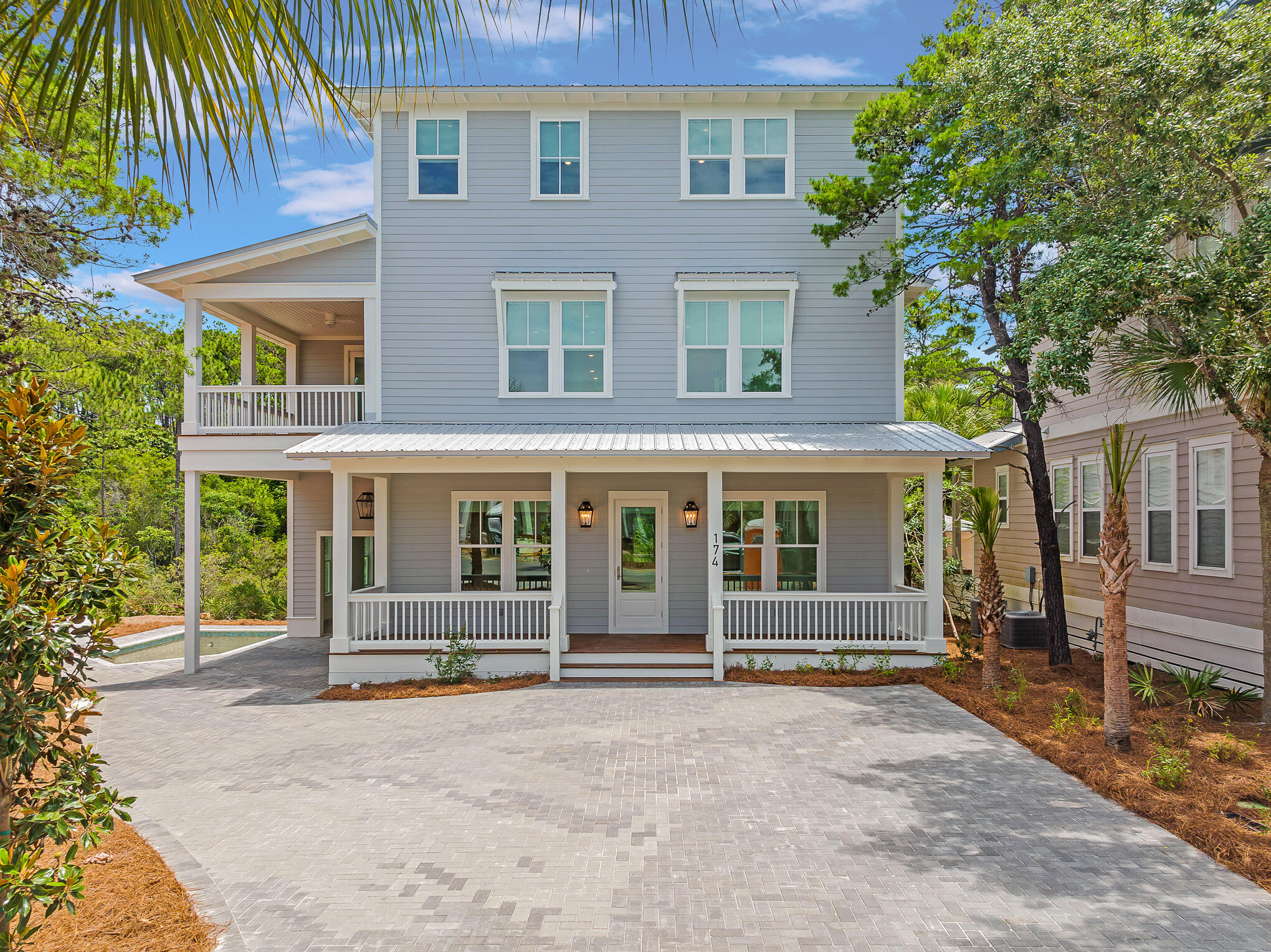 Stunning NEW CONSTRUCTION home on one of the largest lots in Seacrest located on the preserve with tons of privacy.  Home features a PRIVATE POOL, GARAGE and ELEVATOR. Perfect location between Rosemary and Alys Beach. This home features 5 bedrooms, 5 full baths (all bedrooms have ensuite bath) and 2 half baths.  1st floor has open floor plan with large kitchen open to living area and master on main along with 1/2 bath and laundry. As you go to 2nd floor, you'll find additional living area along with 2 bedrooms with ensuite baths, a half bath, and additional laundry area. 3rd floor has 2 more bedrooms. The outdoor space includes back porch overlooking the preserve and leads to your private pool.