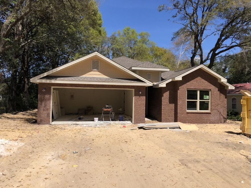 BEAUTIFUL CUSTOM ALL BRICK 4 BEDROOM 2 BATH HOME LOADED WITH AMENITIES. YOU WILL LOVE THIS OPEN FLOOR PLAN WITH A LARGE FAMILY ROOM W/ REVERSE TREY CEILING WITH ROPE LIGHTING AND DIMMER SWITCH. IT GIVES A VERY ELEGANT LOOK IN THE EVENINGS. IF YOU LIKE ENTERTAINING, THEN THIS FLOOR PLAN IS THE HOME FOR YOU!! THE KITCHEN BOAST GRANITE COUNTERTOPS, A CUSTOM BACK SPLASH, LARGE BREAKFAST BAR, CUSTOM CABINETS W/ SOFT SHUT DRAWERS, PANTRY AND STAINLESS STEEL APPLIANCES INCLUDING SIDE BY SIDE REFRIGERATOR W/ ICE MAKER. LARGE MASTER BEDROOM W/ REVERSE TREY CEILING AND ROPE LIGHTING AS WELL. THE MASTER BATH IS INVITING W/ DOUBLE VANITIES, A RELAXING GARDEN TUB WITH DESIGNER BACKSPLASH AND A CUSTOM TILE SEPARATE SHOWER WITH A RAINHEAD, AND SEPARATE SPRAYER. BOTH BATHS AND