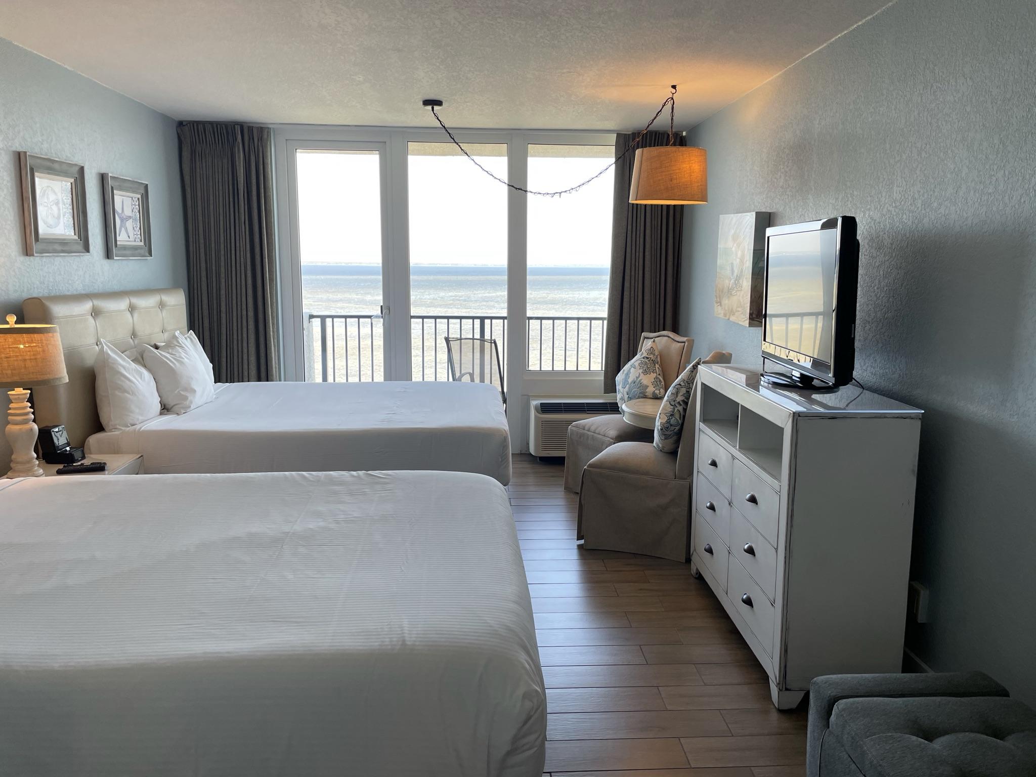 This fifth floor bay facing studio has been completely renovated in coastal colors and decor including new walk-in shower with beautiful marble tile. Two queen beds sleep four and sitting area, bench seat and additional chair provide for lots of seating. Balcony overlooks bay with outdoor seating and side table. Buyer to verify all dimensions, assessment fees, and any detail deemed important. 2021 Association Fees include $966.83/quarter Bayside at Sandestin Condo and $320.00/quarter Sandestin Owners Association.