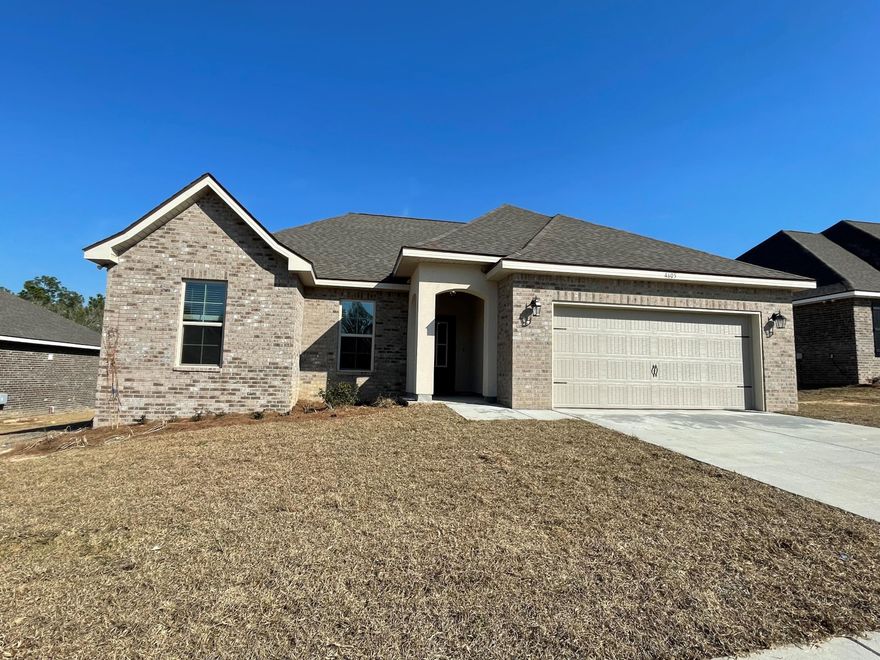 Awesome Builder Rate Incentives!  (Restrictions apply) The RAVENSWOOD V B in Patriot Ridge community offers a 4 bedroom, 2 full bathroom, open design. Upgrades added (list attached).Features: double vanity, garden tub, separate custom tiled shower, and 2 walk-in closets in the master bath, ceiling fan in living room and master bedroom, kitchen island, recessed can lighting in kitchen, covered porch and patio, crown molding, undermount sinks, framed mirrors, smoke and carbon monoxide detectors, landscaping, architectural 30-year shingles, flood lights, and more!Energy Efficient Features:  electric water heater, a kitchen appliance package with a electric range, vinyl low E MI windows, and more!