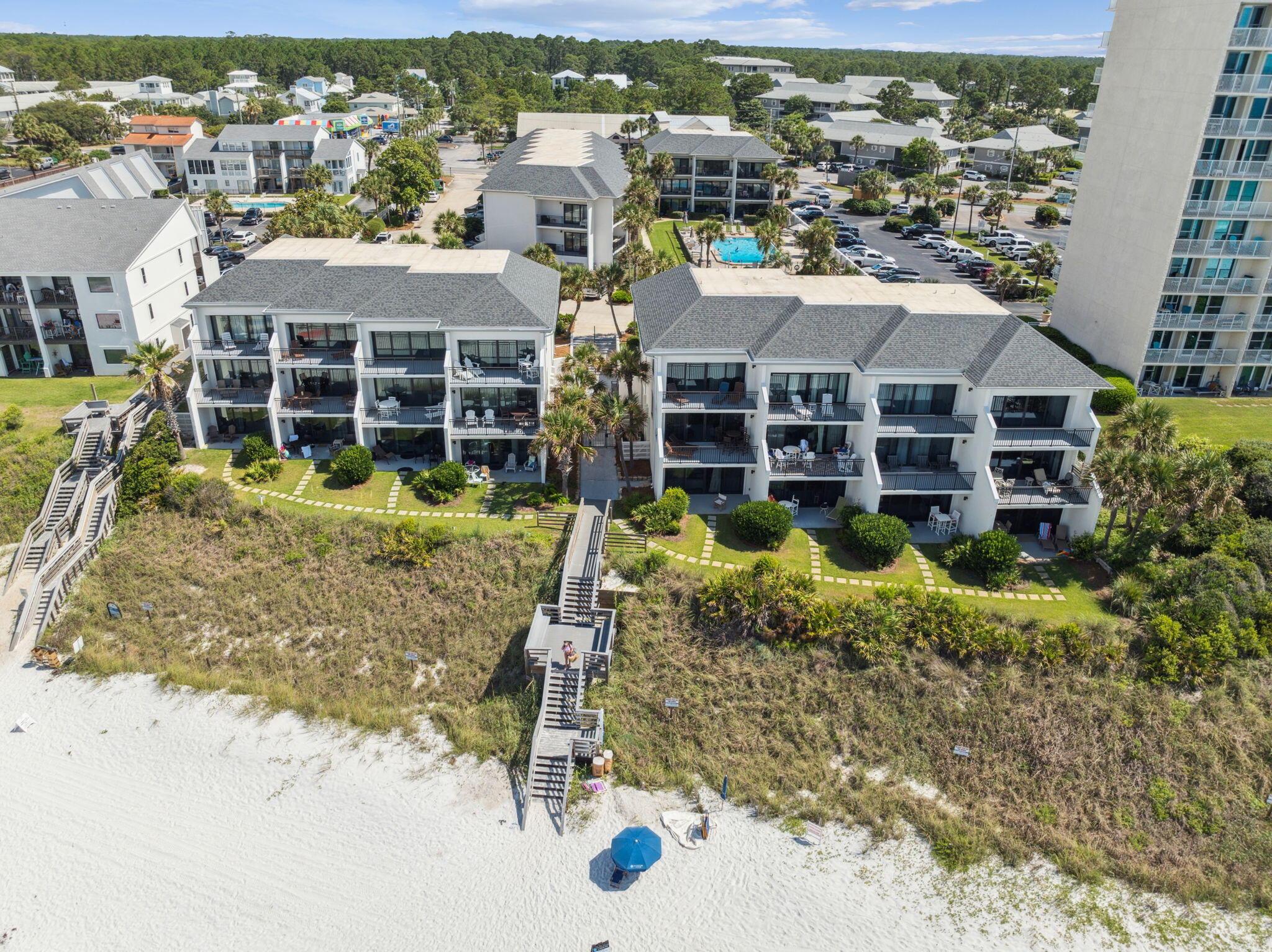 Rare opportunity to own the lowest 1BR/1BA on the east side of 30A with a direct gulf view!!! Located at Emerald Hill, a low rise concrete and steel complex in the heart of Seagrove. Ground floor unit, just a few steps directly from your private patio to the dune walkover. Large open floor plan with high ceilings. Large master bedroom and bath. Well maintained and quiet grounds provide a sense of calm, yet just a short walk, bike or golf cart ride away all of the shops and restaurants in Seagrove, Seaside and Watercolor. Sold fully furnished. Perfect for a rental investment and a 30A beach getaway!
