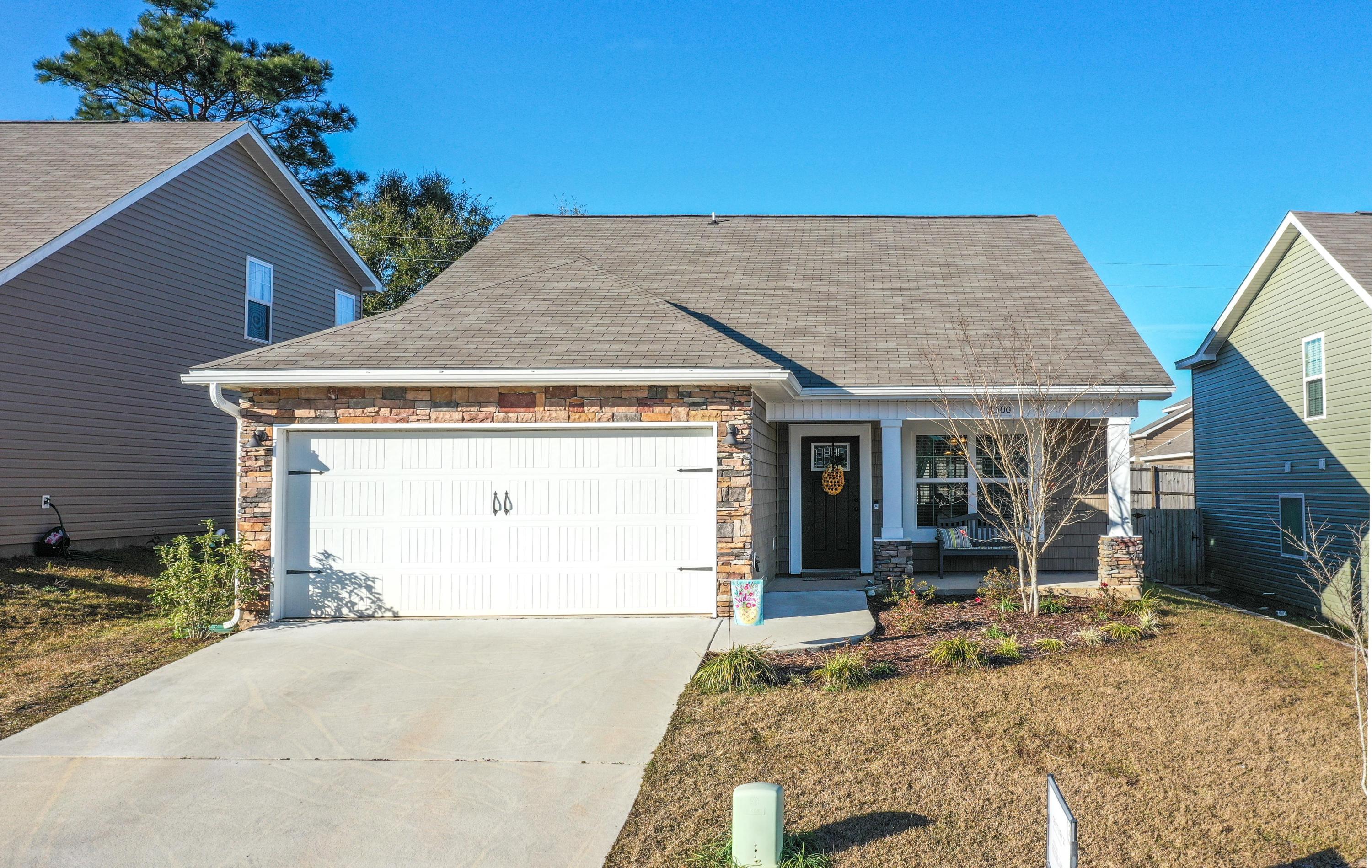 This is a two story home that was just built a few years ago. The owners have kept it looking brand new. It has a wonderful plan that offers a living, dining room, kitchen with breakfast bar, pantry, smooth top stove and built microwave. All appliances are stainless steel. There is an upstairs area that could be used as an office media area, etc. Inside laundry and two car garage. Down stairs Master suite with dual vanities, walk in closet, separate shower and tub. Half bath downstairs for your guests. This floor plan lives larger than its actual square footage and is a must see.