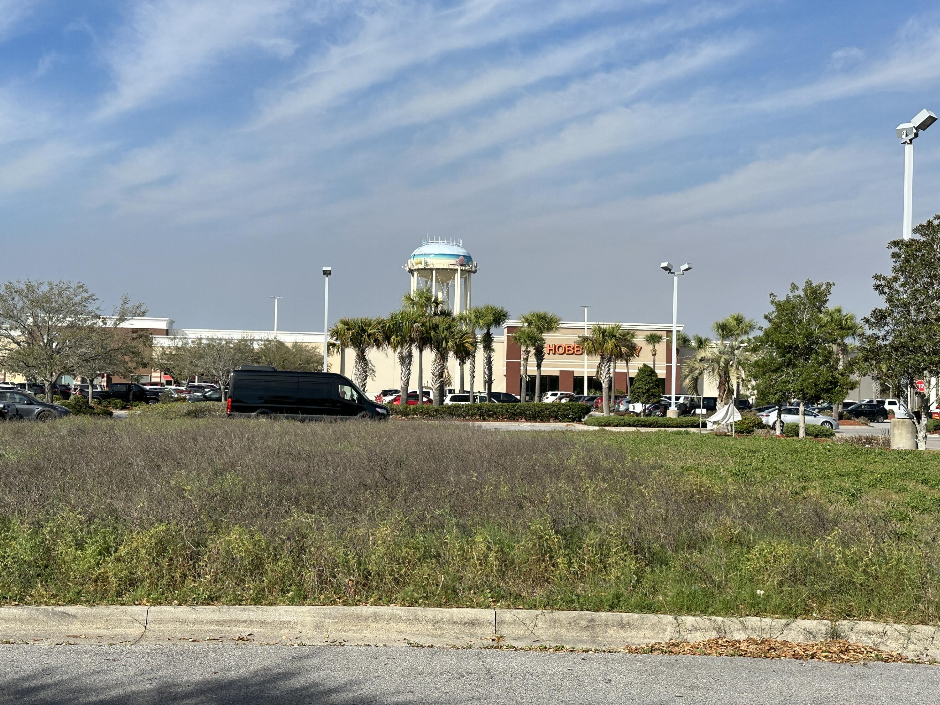 OUTPARCEL- located at 'The Shoppes at 98 Palms' shopping center..Prime retail commercial location in the heart of Destin on Hwy 98. This outparcel is adjacent to McDonald's and just South of Target and Hobby Lobby.Greta exposure with 50,000 + car counts per day.Approximately .46 acres with ample parking.This outparcel is governed by McDonald's Corporate covenants and restrictions. Zoned Town Center Mixed Use TCMU.NO FOOD OR BEVERAGE BUSINESS ALLOWED.Perfect for most any service business.